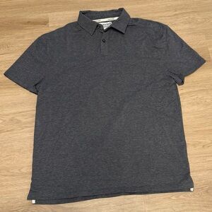 PERFORMANCE KNIT HEATHERED POLO IN HEATHERED DARK GREY